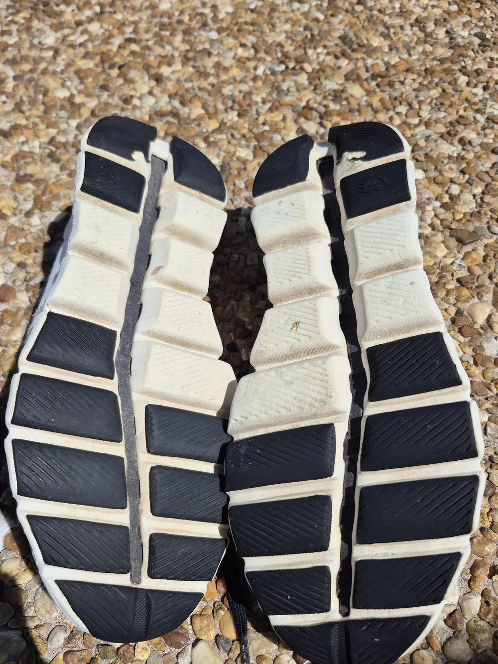On Running Men’s Cloud Athletic Sneakers in White and Black